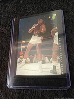 Front side of Muhammad Ali boxing card showing him in the ring, with 'World Class Athletes' label.
