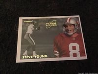 Front image of 1993 Fleer All-Pro Steve Young football card showing player in red 49ers jersey #8 and black and white passing image.
