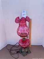 Full view of lamp assembled showing shade and base.