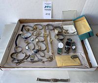 Full lot of women’s watches and bands displayed in tray