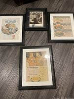 Four framed vintage advertising prints laid on a floor, three large 15x19" with breakfast food ads, one smaller 14x12" Morton Salt print.