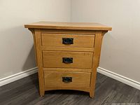 Front view of small 3-drawer dresser showing size and design