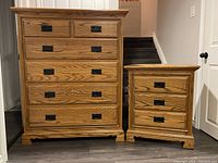 Amish-made oak tall boy dresser and night stand side by side