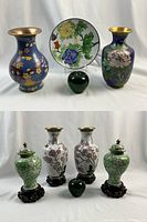 Overview of six cloisonne decorative items with size-reference green glass apple