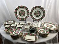 Overview of all Royal Albert Crown China Needle Point and Bone China Petit Point items arranged on white backdrop