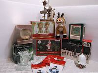 Full lot arrangement showing all included items in original boxes and loose items, with clear visibility of titles on packaging