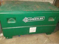 Front view of closed Greenlee job box showing logo and overall condition