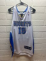 Front view of Denver Nuggets basketball jersey with Carmelo Anthony's number 15.