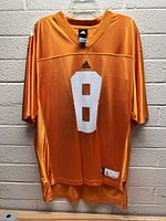 Front view of orange Tennessee Vols Adidas football jersey with white number 8 and Adidas logo.
