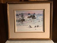 Frontal view of framed painting showing entire composition and mat