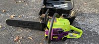 Poulan Wild Thing chainsaw with colorful housing, black saw bar, and front handle.