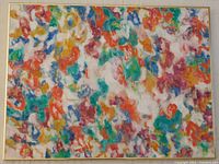 Full view of colorful abstract acrylic painting on canvas in a gold frame.