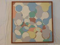 Front view of abstract oil painting in wood frame