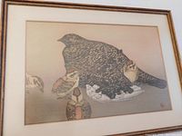 Close-up of the woodblock print showing detailed bird with chicks and artist seal.