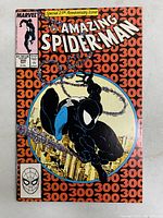 Front cover of The Amazing Spider-Man #300 showing black-suited Spider-Man and repeating “300” background