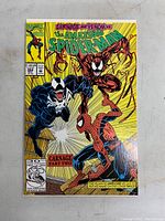 Front cover of The Amazing Spider-Man#362 comic book showing Venom, Carnage and Spider-Man on a bright yellow background with 30th anniversary logo