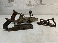 Three metal planes (No.45, No.78, No.278) displayed on white surface