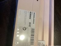 Photo of sealed IKEA MOSSLANDA label showing product and measurements.