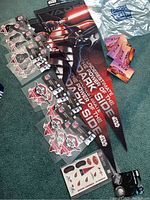 Image showing Star Wars themed pennants with Darth Vader and themed text, Cardinals decals, Super Bowl XLIX foam fingers, and Star Wars buttons.