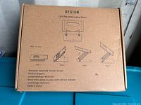 Photo of the unopened box showing the product name and instructions for use with line drawings illustrating the folding and adjustment steps.