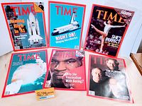 Six TIME magazines with covers showing space shuttle, ballerina, boxing, Olympians, and athletes.