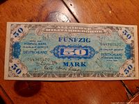 Front view of WWII Allied Military Government 50 Mark note from 1944, showing detailed design, serial number and signatures.