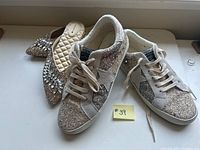 Birdies flats and Vintage Havana sneakers showing sparkle and size tag