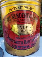 Front view showing the painted label with pig logo, brand, and weight information.