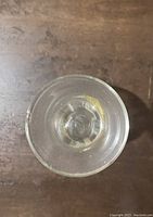 Top view of the clear cocktail glass showing round opening and smooth rim.