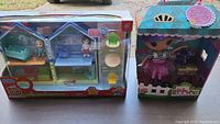 Cocomelon Deluxe Family House Playset in box showing house and accessories.