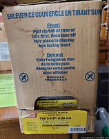 Box showing labels of 3 1/4 inch common nails with details including size 12d, 3 1/4", smooth shank, made in U.A.E.