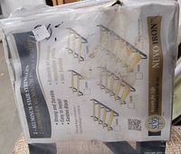 Photo of the packaging showing product details such as brand Nuvo Iron, product features, and stair stringer illustrations.