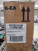 Cardboard shipping box with product label showing item code EHFS015CAN and case count of 6 units