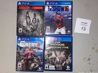 Front cover of 4 PS4 games: Evolve, MLB The Show 16, Far Cry 4 Limited Edition, For Honor Marching Fire Edition