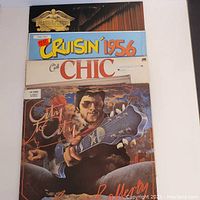 Stacked view of four vintage vinyl album covers, showing titles and artwork including Chic, Cruisin' 1956, Mathew Ward and Gerry Rafferty albums.