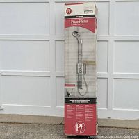 Front view of boxed Price Pfister thermostatic shower panel showing branding and product image