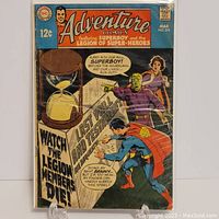 Full front cover photo of Adventure Comics #378 showing Superboy and Legion of Super-Heroes with dramatic hourglass and call to action text