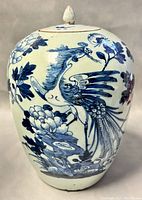 Front view showing hand-painted crane and peony design