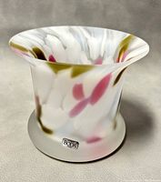 Side view of frosted glass vase showing multicolor white, olive green, and pink pattern and Boda label on base.