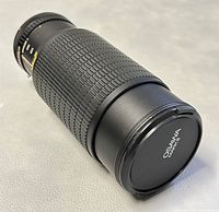 OSAWA MARK II zoom lens with cap on, displaying textured zoom barrel and brand labeling on cap.