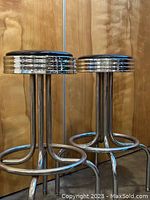 Pair of vintage Deco/Retro style bar stools with black vinyl seats and chrome frames