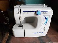EuroPro X sewing machine with stitch selector dial and stitch pattern chart on front, side view showing structure and controls.