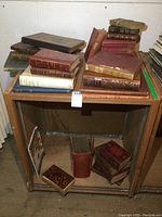 Full shelf view showing top and bottom shelves with assorted books