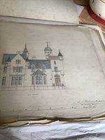 Colored front elevation of mansion with turret and entry