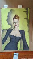 Full-view of portrait mounted on cardboard backing