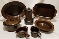 Group shot of all seven pieces on white background