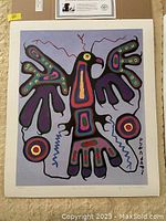 Full view of the colorful Thunderbird print with gray background and vibrant shapes.
