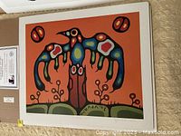 Full view of the Thunderbird Spirit print on an orange background showing vibrant multicolor Thunderbird and abstract elements
