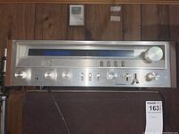 Front view of Pioneer FM quartz stereo receiver SX-3700 showing control knobs and tuning dial.