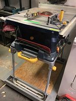 Full view of Mastercraft table saw on stand with blade and guard installed.